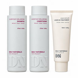 Three Daily Naturals Clear Beauty hair care products on a white background: Everyday Balancing Shampoo, Everyday Balancing Conditioner, and Ends Sealer Leave In Treatment.
