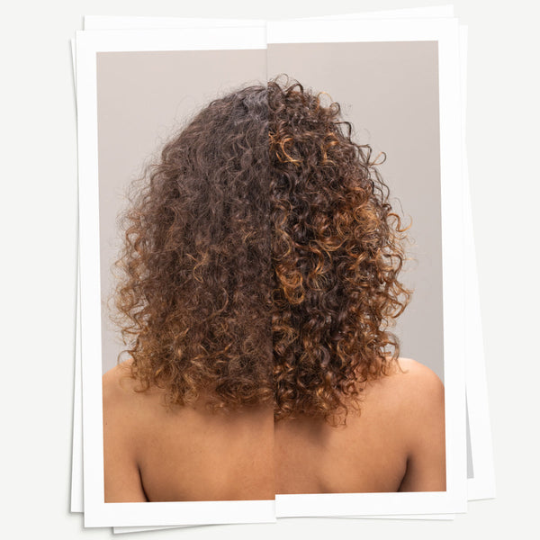 Curly hair from behind on a plain background