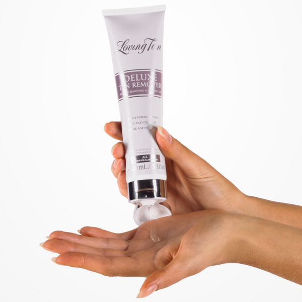 Loving Tan Deluxe Tan Remover being poured onto a hand