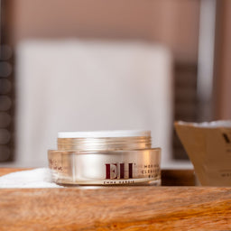 Jar of Emma Hardie Cleansing Balm on a bathroom tray