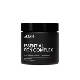 Black container of Artah Essential Iron Complex on a light gray background with a Vogue Approved badge.