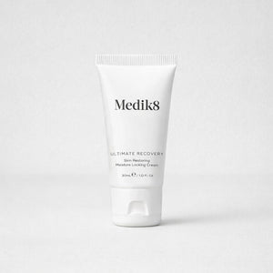 Medik8 skincare cream tube on a white background