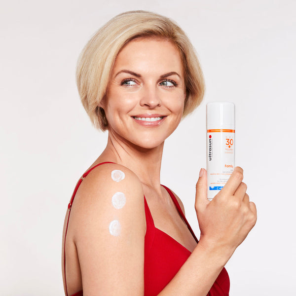 Ultrasun Family SPF 30 100ml being applied to arm