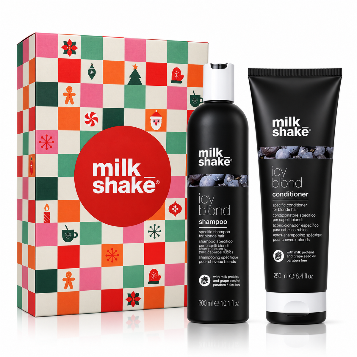 Milk Shake Icy Blond hair care set featuring a 300 ml bottle of shampoo and a 250 ml tube of conditioner, displayed next to their colorful Christmas-themed gift box on a white background.