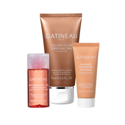 Gatineau skincare products including a tube, bottle, and scrub on a white background