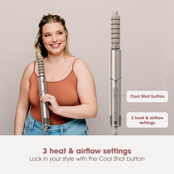 Woman holding a hair styling tool with text on heat and airflow settings against a plain background
