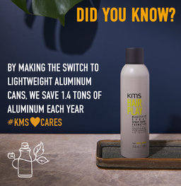KMS Hair Play product bottle with sustainability message on a dark background
