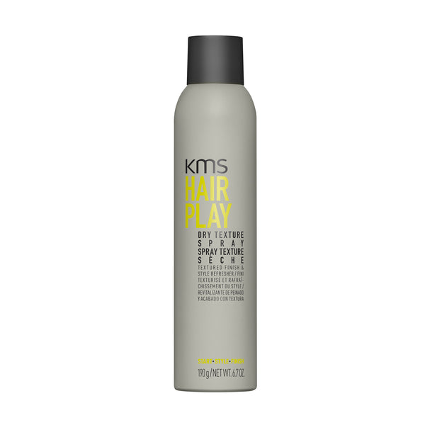KMS Hair Play dry texture spray bottle on a white background