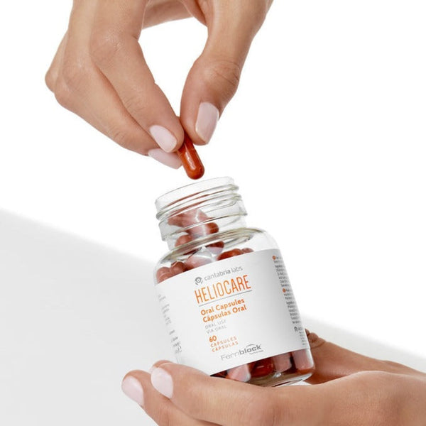 A single capsule being removed from the jar
