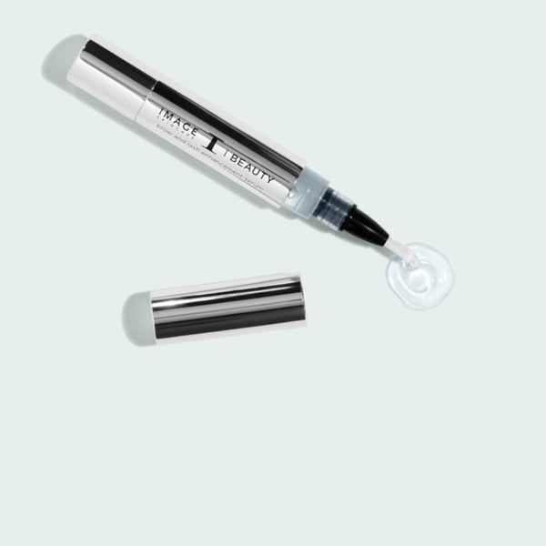 Image Skincare I-Beauty Brow and Lash Enhancement Serum with its contents poured out