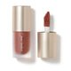 Lip tint with applicator and visible brand name on a white background
