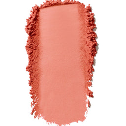 Pink makeup swatch on a white background