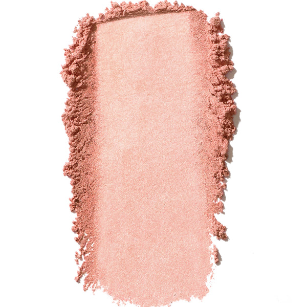 Pink makeup swatch on a white background