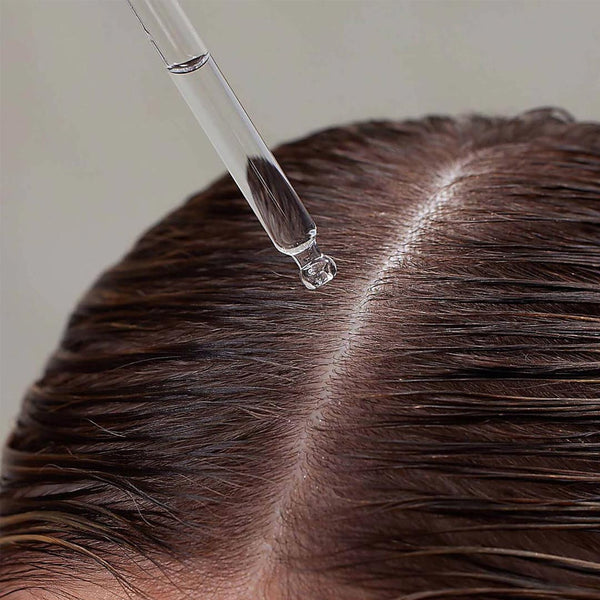 Innersense Hair Renew Daily Active Scalp Treatment being applied to scalp
