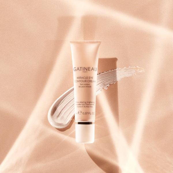 Gatineau skincare cream tube on a soft beige background