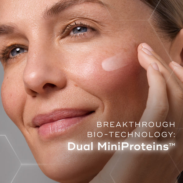 Woman applying a product to her face with text about Dual MiniProteins technology.