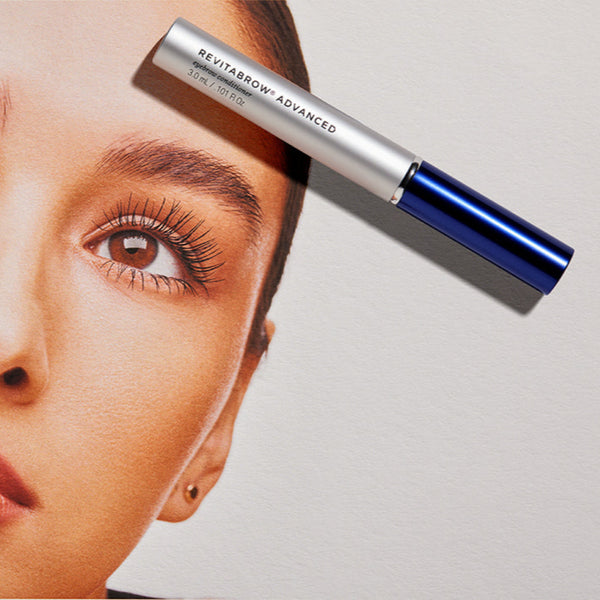 RevitaLash Advanced mascara on a model's eyelashes with a neutral background