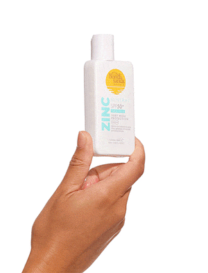 Bondi Sands Mineral Face Fluid held in a hand
