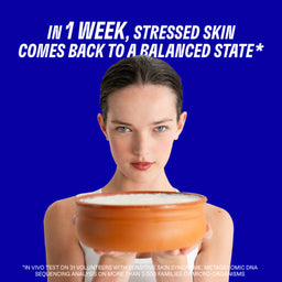 Woman holding a bowl with text about skin health on a blue background