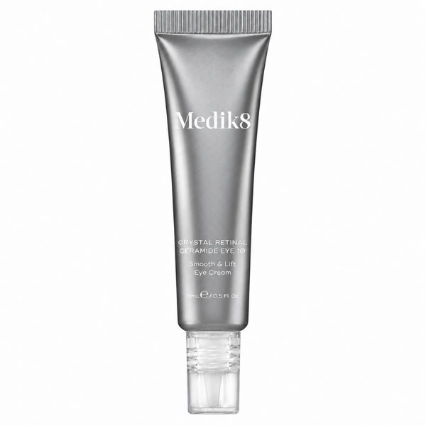 Medik8 Crystal Retinal Ceramide Eye Cream in a metallic silver squeeze tube with a clear cap, shown against a plain white background.