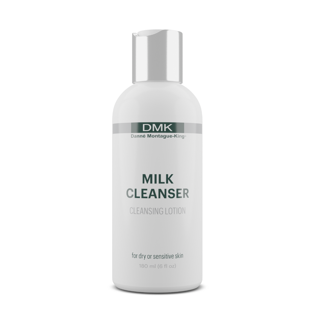 Bottle of DMK Milk Cleanser on a white background