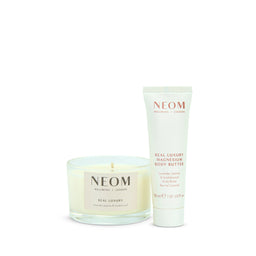 NEOM Real Luxury magnesium body butter and candle on a white background