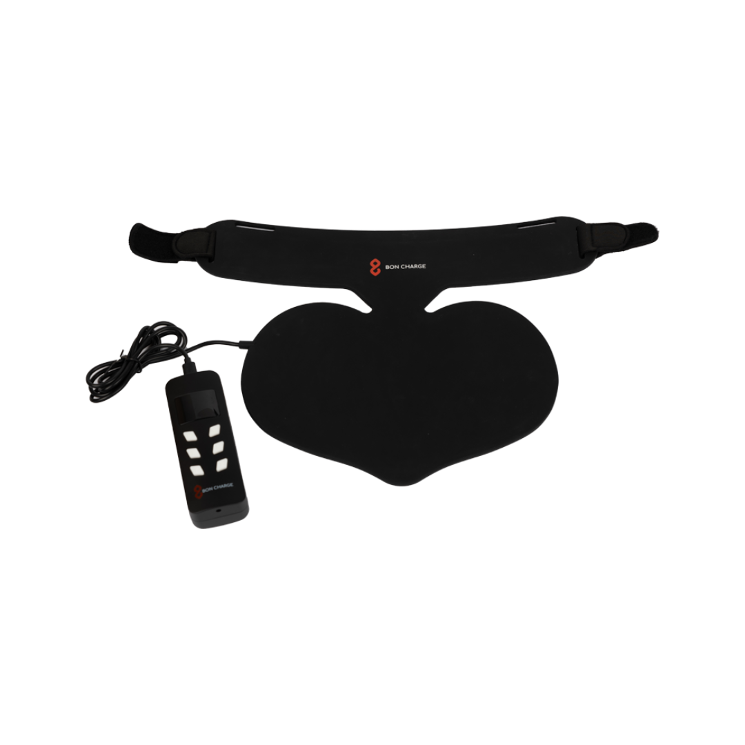 Black heating pad with remote control on a white background