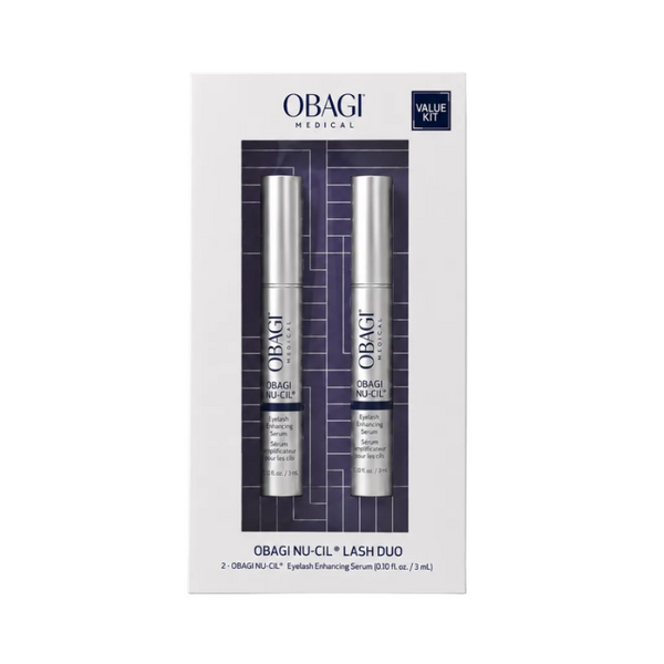 Obagi Medical Value Out Obagi Nu-Cil Lash Duo in a white rectangular box with a clear window showing two silver cosmetic tubes, photographed on a light gray background.