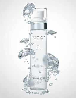Revitalash Cosmetics Micellar Water Lash Wash bottle with water droplets on a light gray background