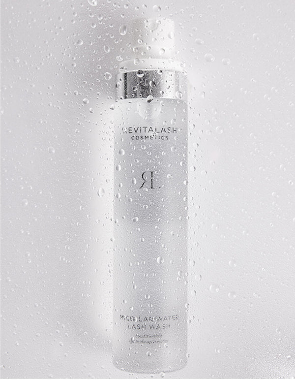 Revitalash cosmetic bottle on a gray background