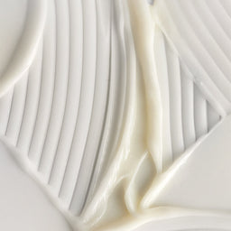 Close-up of white fabric with a textured pattern