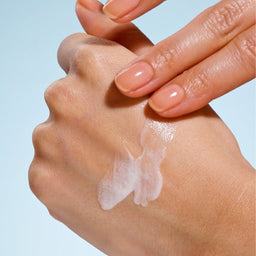 Coco & Eve Daily Watergel SPF50 applied to a hand