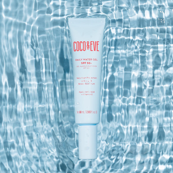 Coco & Eve Daily Watergel SPF50 in a pool of water