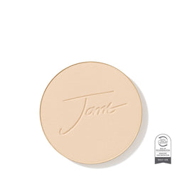 A round beige makeup compact with the brand name 'Jani' embossed in the center, shown on a clean white background with a small 'Made in India' badge in the bottom right corner.