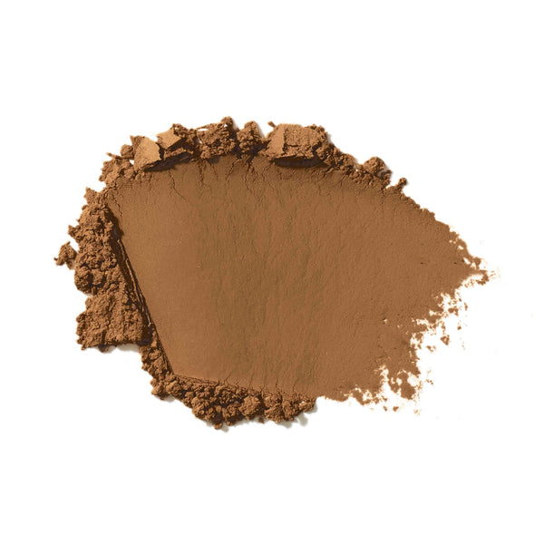 Brown makeup powder on a white background