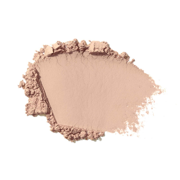 Pink makeup powder on a white background