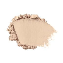 Beige makeup powder on a white background