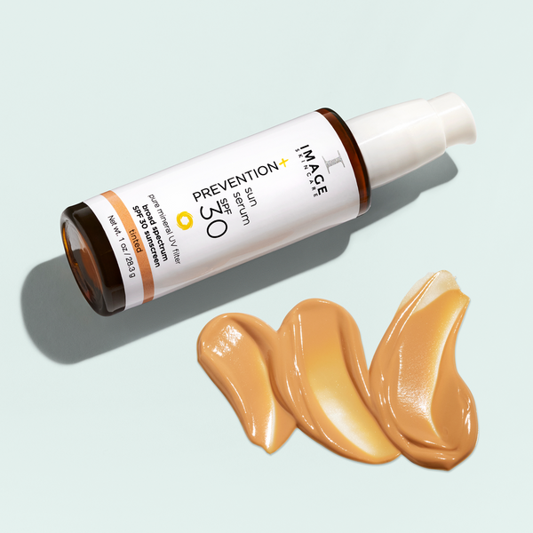 Image Skincare PREVENTION+ Tinted Sun Serum SPF 30 bottle with serum spread next to the bottle