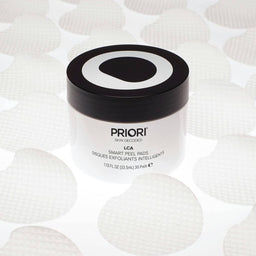 a tub of PRIORI LCA - Smart Peel Pads surrounded by the pads