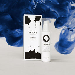 PRIORI LCA - Skin Renewal Creme with blue smoke behind the bottle