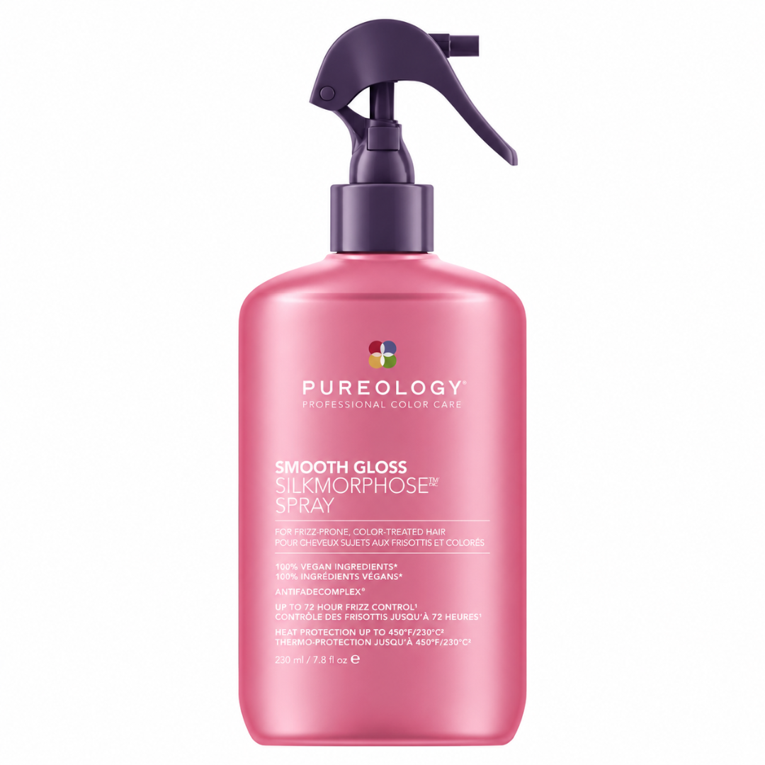 A pink bottle of Pureology Smooth Gloss Silkmorphose Spray with a dark purple trigger sprayer, shown on a solid white background.