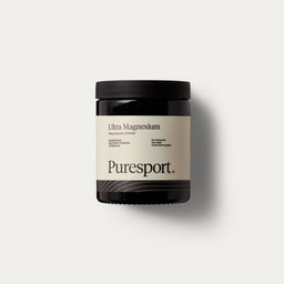 A jar of magnesium supplements by Puresport with a label that includes the Puresport logo and ingredients such as beetroot powder and vitamin d3. 