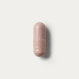 Pink capsules of magnesium by Puresport. 