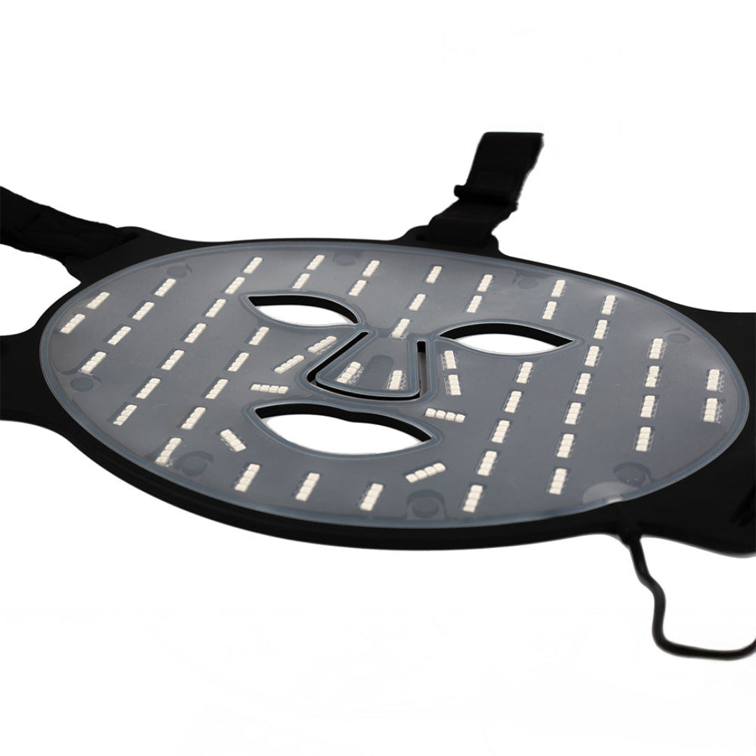 Black face mask with reflective stripes on a white background