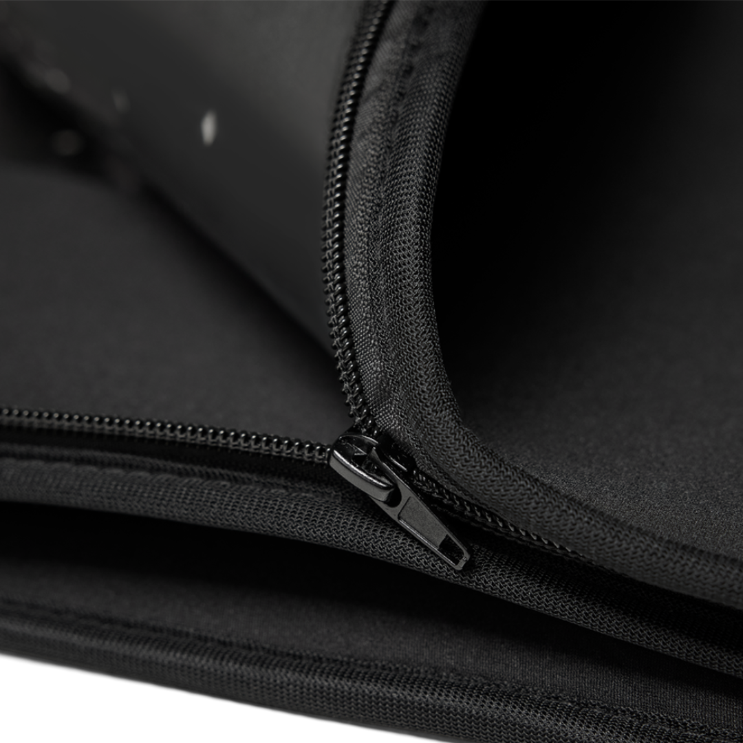 Close-up of a black zipper on a black bag