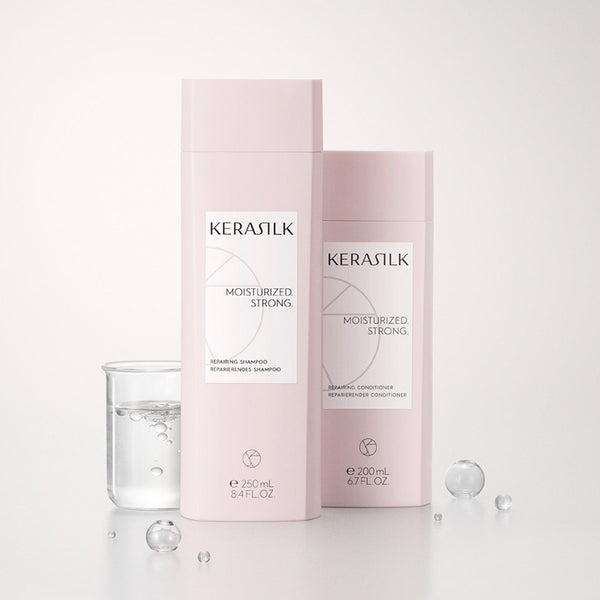 Kerasilk shampoo and conditioner bottles on a white background