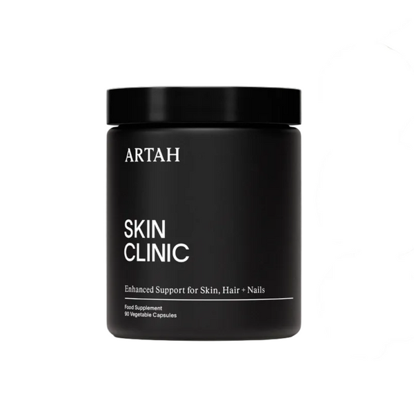Black supplement jar labeled 'ARTAH Skin Clinic' with various awards on a light gray background