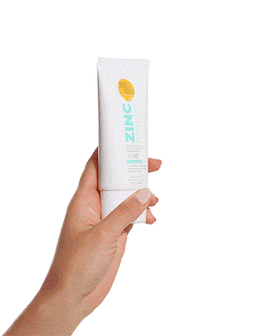 Bondi Sands SPF50+ Mineral Face Lotion held in a hand