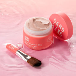 Sand & Sky Australian Pink Clay Porefining Face Mask with an open lid revealing its contents