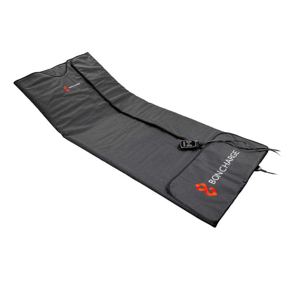 Gray blanket with 'BON CHARGE' branding on a white background